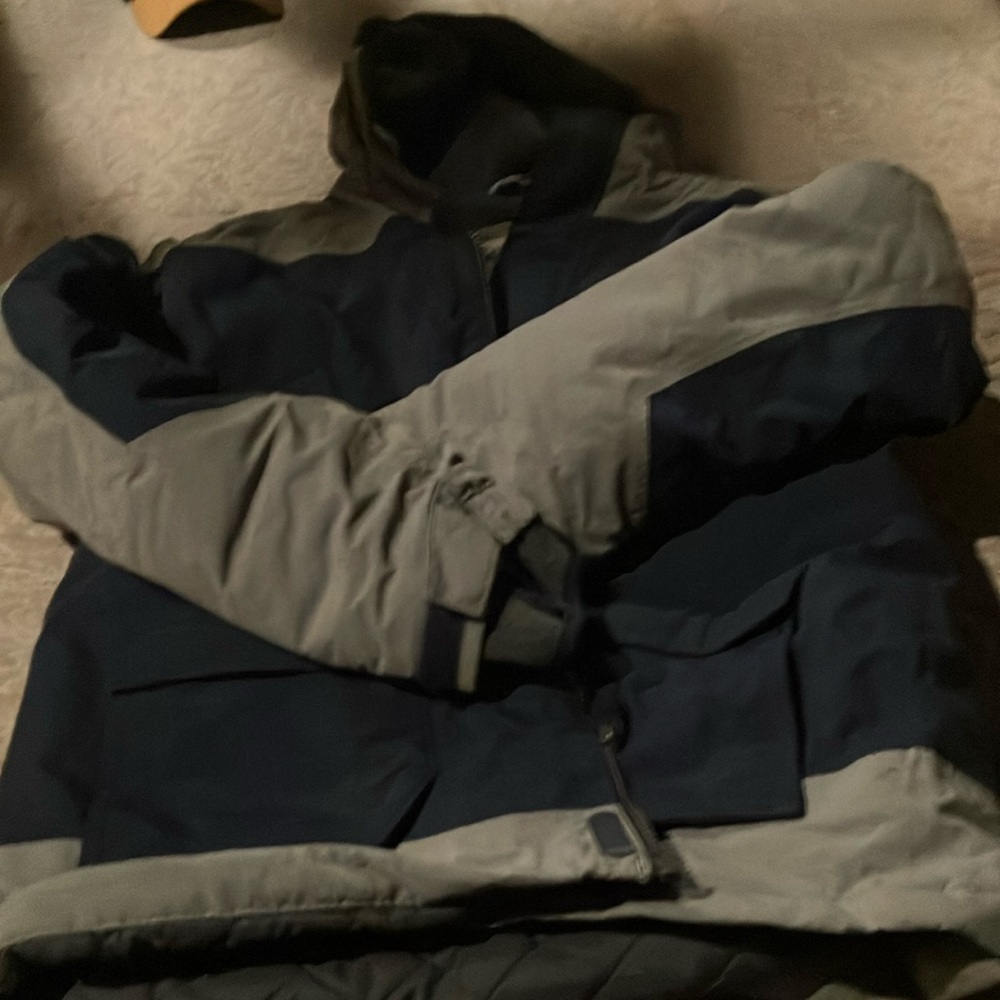 Kids brand new with tags Land Ends winter jacket size 14-16. Very warm